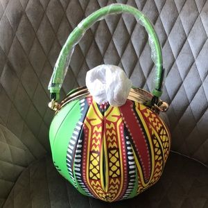 Very unique Vegan  handbag with extra strap and colorful details